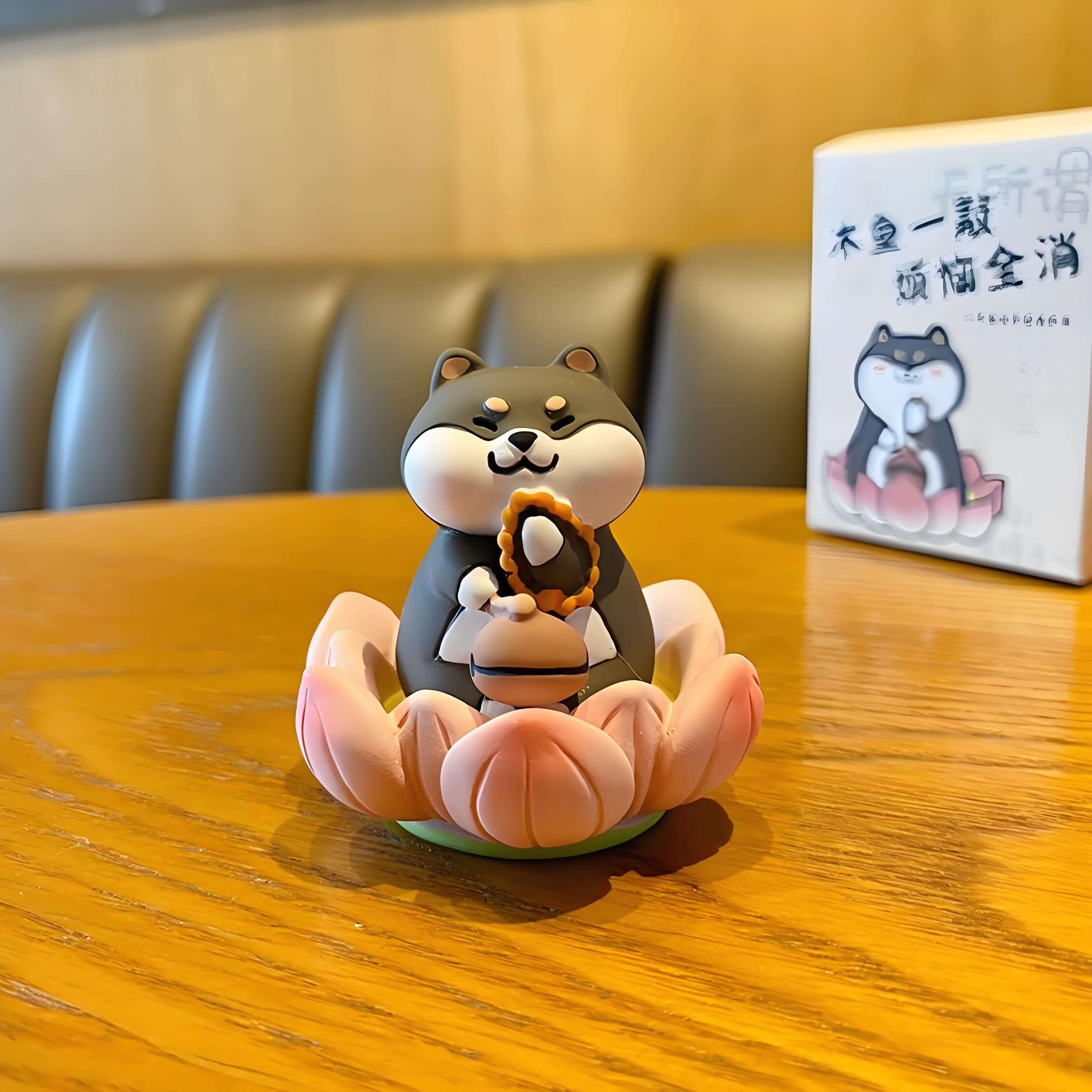 a black Shiba figure on the yellow table