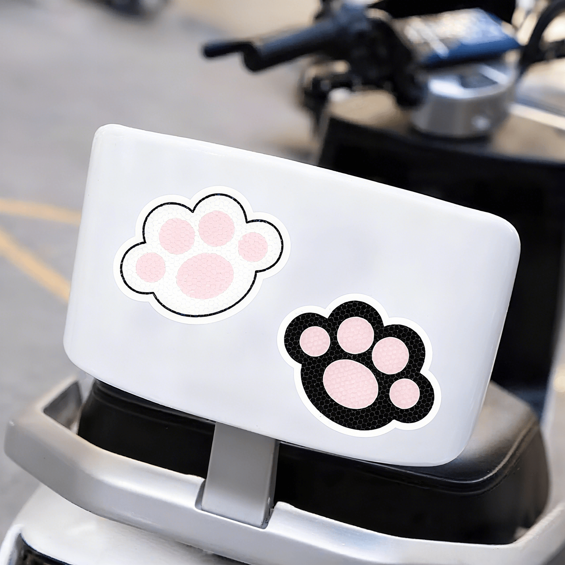1 pair of cat paw reflective stickers on a bicycle