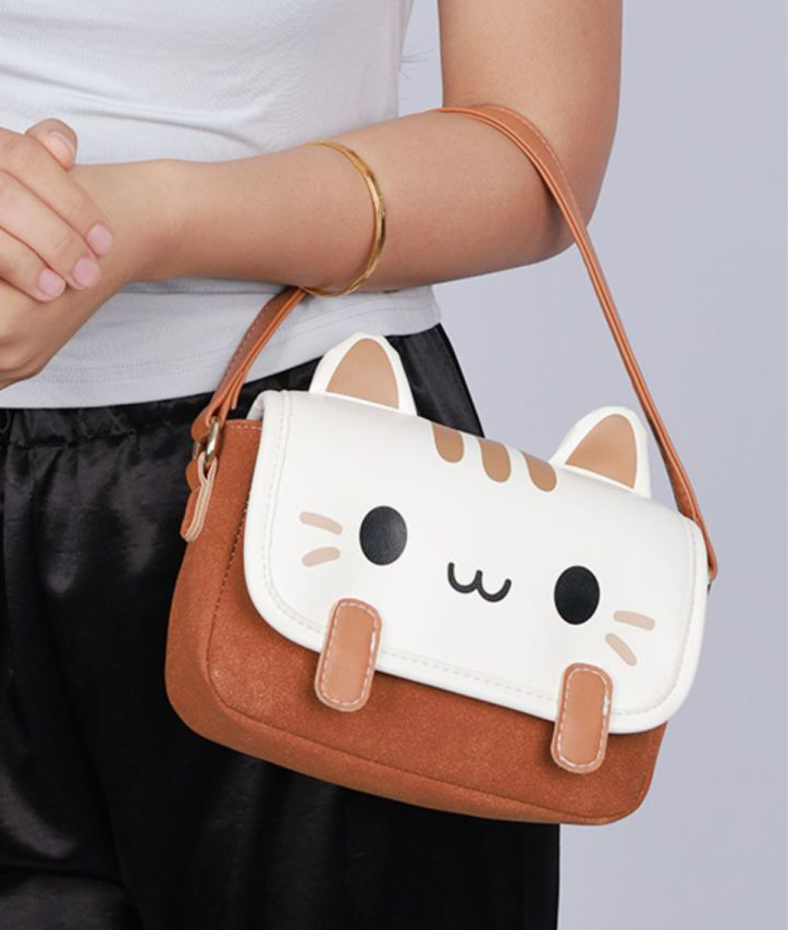 cute cat handbag on the arm