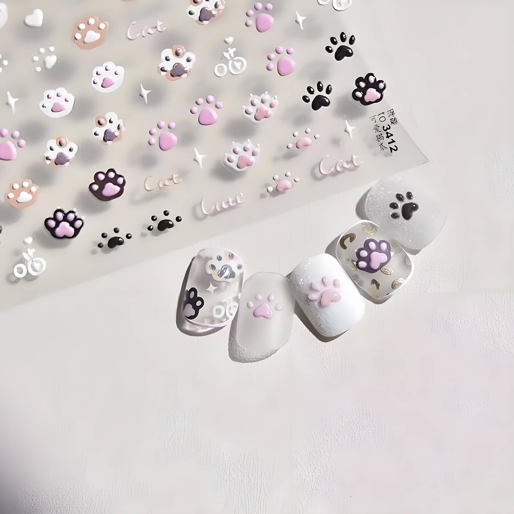 cat paw nail stickers demonstrated beautify on fake nails