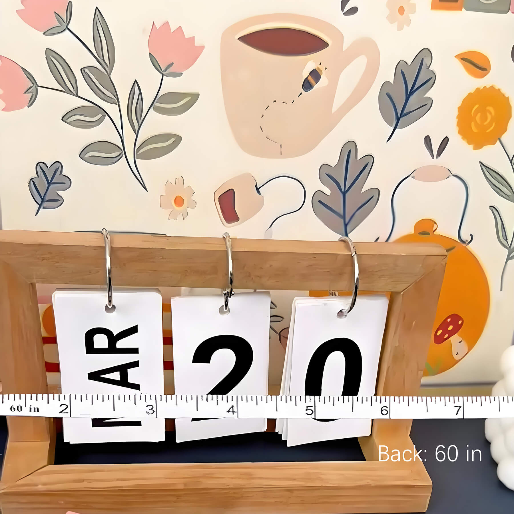 inch tape measure is measuring a calendar